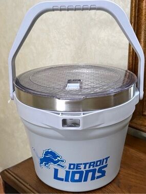 Detroit Lions Stainless Steel Insulated Ice Bucket. Built in bottle opener.